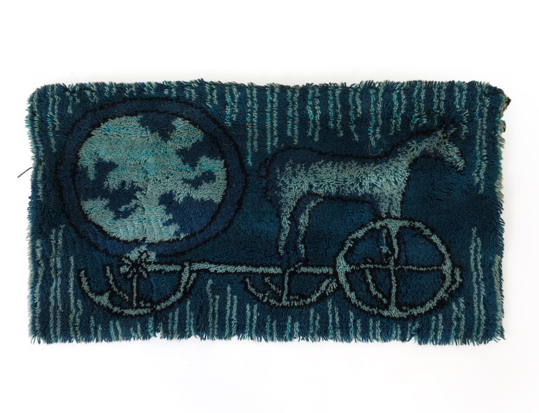 SCANDINAVIAN RYA RUG TAPESTRY: Wall tapestry using blues and greens, depicting a horse cart. Apparently unmarked. Dimensions: L 47" x W 24.5" Condition: Some separation from back hanging panel. Spots of discoloration/soiling and