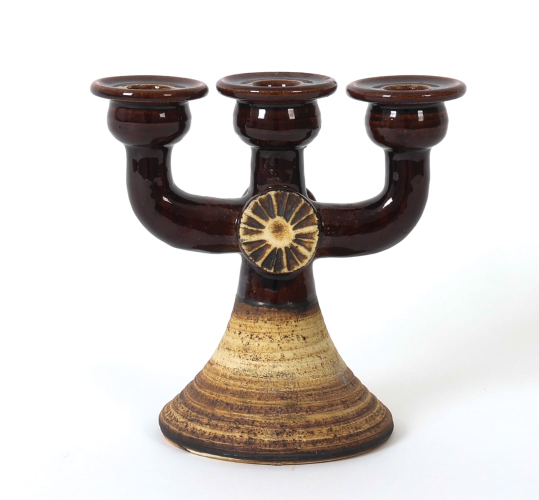 BIRGITTE ANDREZAJAK DANISH CERAMIC CANDLE HOLDER: Three-armed candle holder or candelabra in two-tone finish and carved details. Signed underneath. Denmark, circa 1970s. Dimensions: H 7" x W 7" x D 4.5" Condition: Wear consistent with age and use.