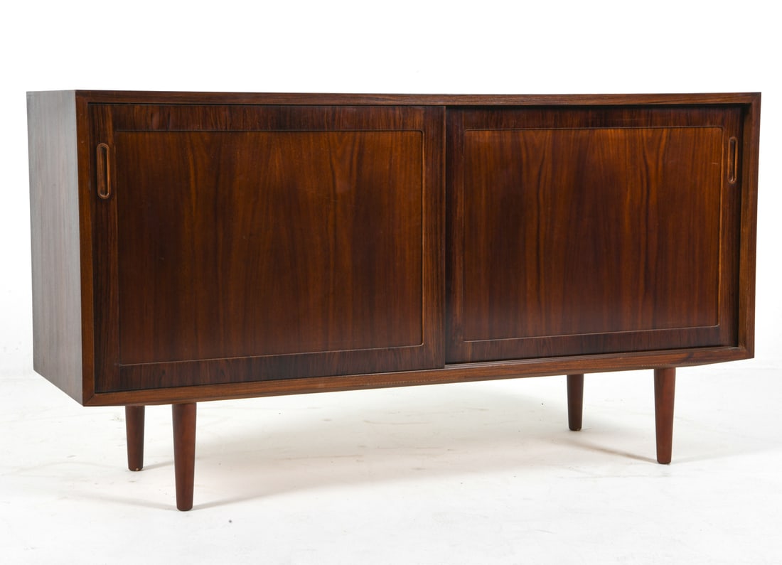 POUL HUNDEVAD DANISH ROSEWOOD CABINET C. 1960S: Adjustable shelves and a felt-lined drawer. Marked to back. Denmark, circa 1960s. Dimensions: H 29.5" x W 54" x D 17". Condition: Few scratches and dings, wear consistent with age and use. J010
