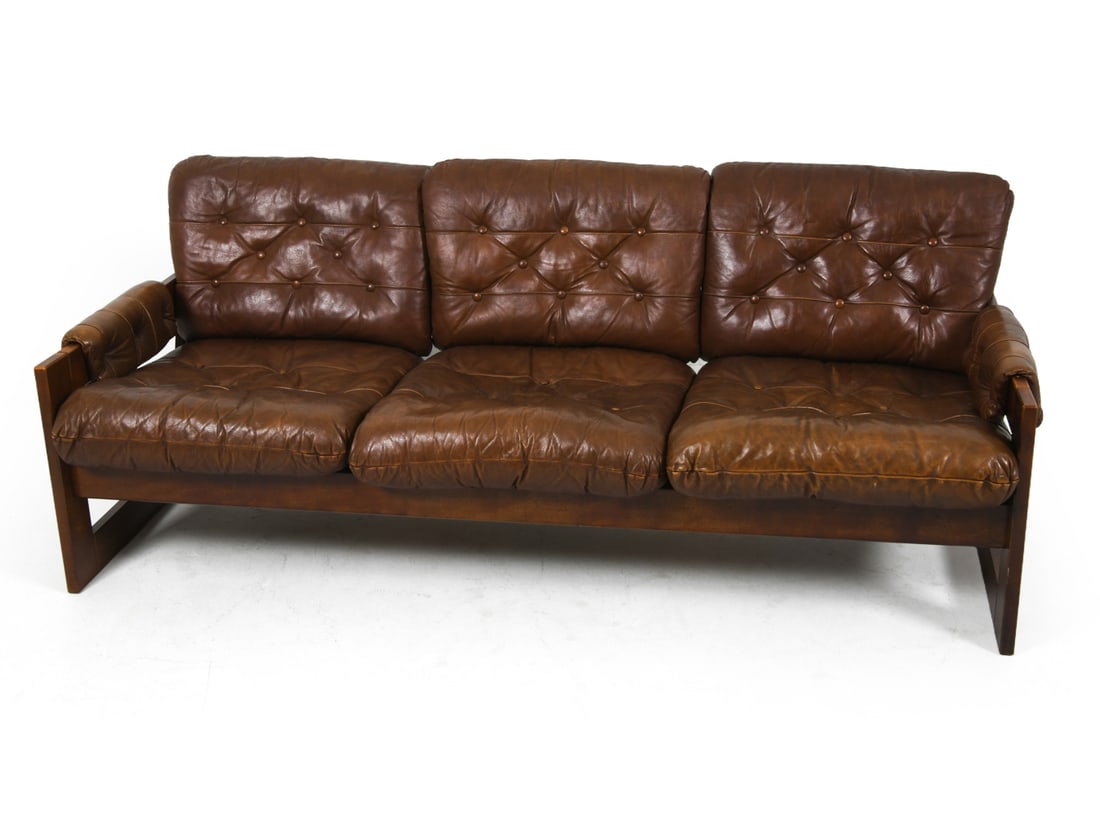 ARNE NORELL STYLE DANISH LEATHER & OAK SOFA 1970S: Oak frame with tufted brown leather. Denmark, circa 1970s. Dimensions: H 30" x W 73" x D 28" x S.H. 16.5". Condition: Wear consistent with age and use. Faint rubs to leather. J038