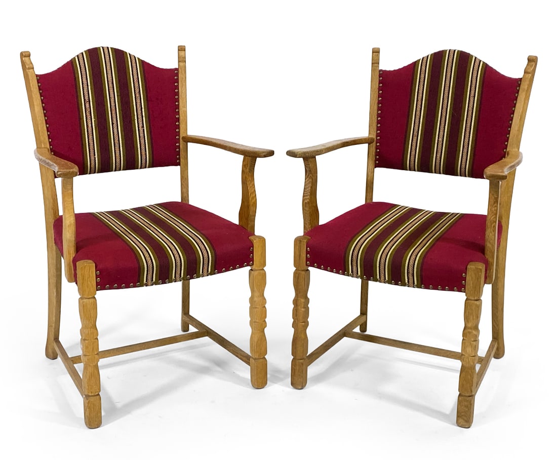 PAIR STYLE OF KJAERNULF OAK DINING CHAIRS C. 1970S: Oak frames with turned front legs. Stripe pattern upholstery with brass tacks accents. Denmark, circa 1970s. Dimensions: H 37" x W 20" x D 19.75" x SH 18.25". Condition: Few dings and marks. Wear cons
