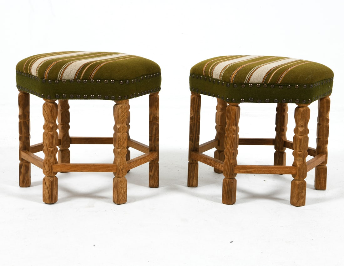 PAIR OF KJAERNULF STYLE DANISH FOOTSTOOL OTTOMANS: Turned oak frames with wool upholstery. C. 1960s H:14" x D:14" Condition: Wear consistent with age and use.