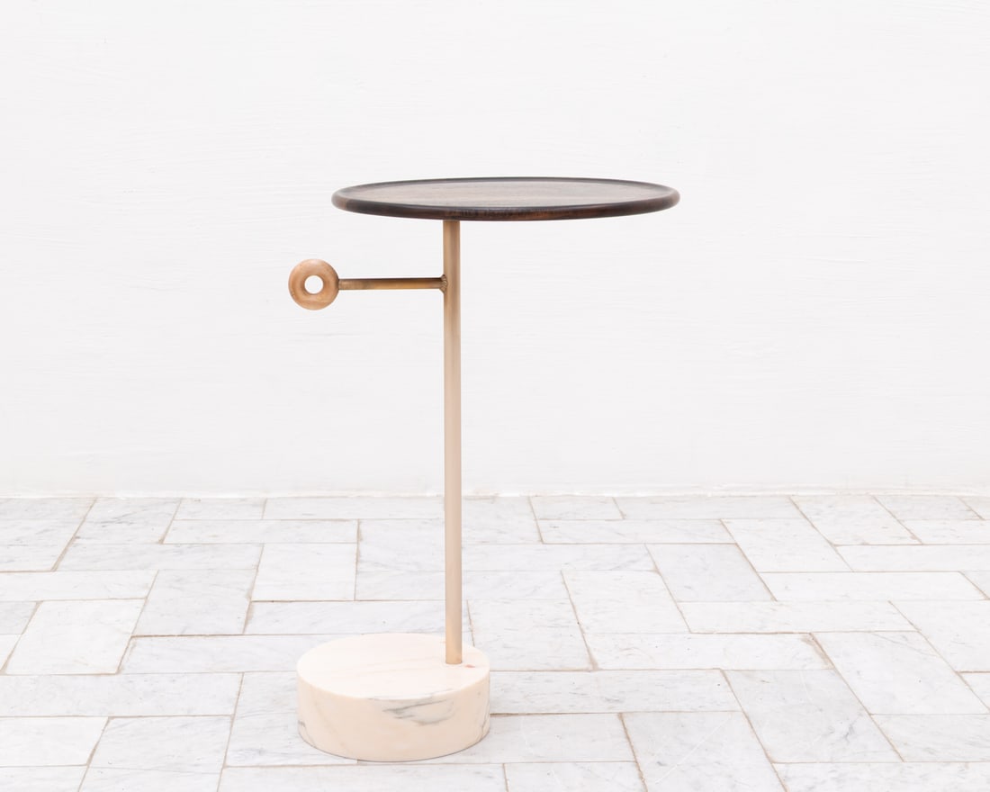 TYLER HAYS FOR BDDW LUG WALNUT & MARBLE SIDE TABLE: Lug side table in walnut top, bronze stem with maple handle and marble base. Dimensions: H 24.25" x D 16.5" Condition: Wear consistent with age and use, including minor rubs and scuffs.
