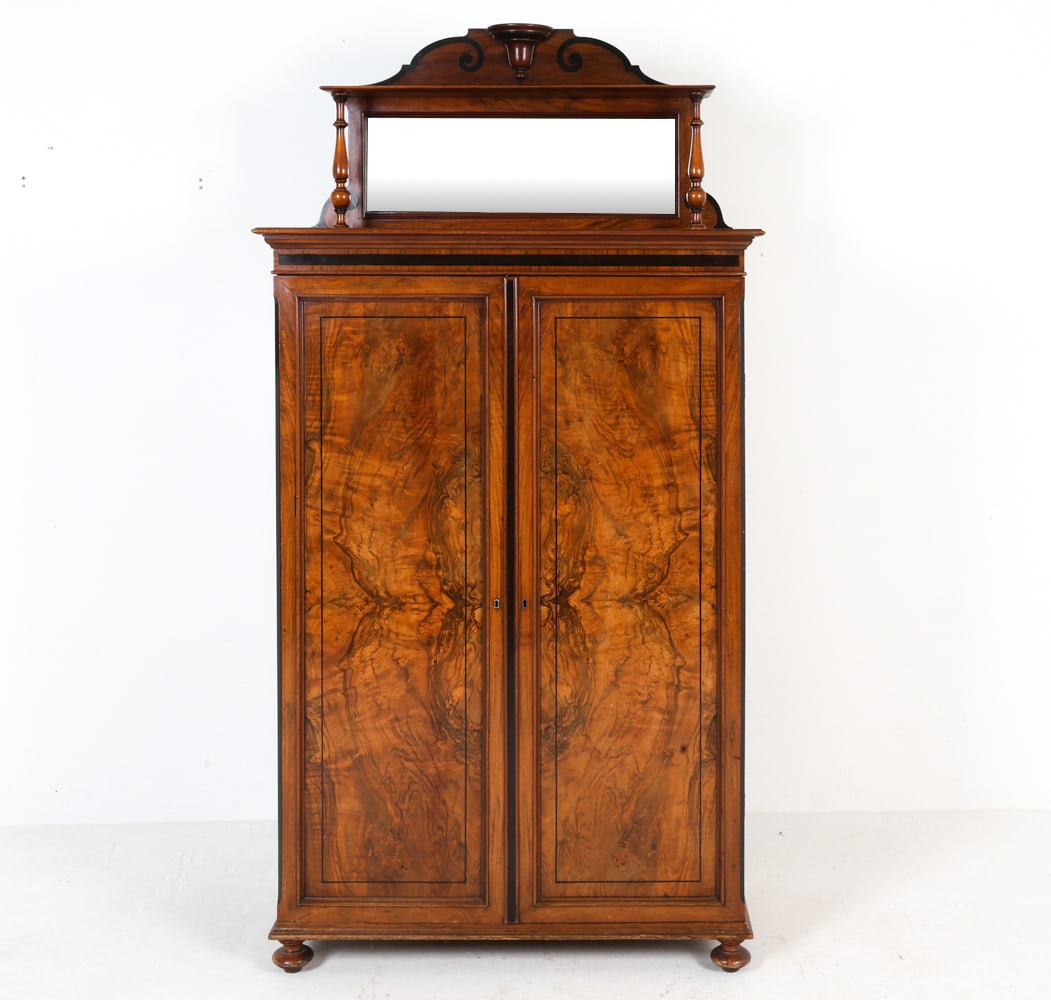 BIEDERMEIER STYLE BURL WALNUT DRESSER W MIRROR: Key included. Mirror on upper gallery is fixed with dowels. Ebonized line inlay. Cabinet doors open to reveal chest of drawers. Early 20th century. Dimensions: H 78" x W 39.5" x D 20". Condition: