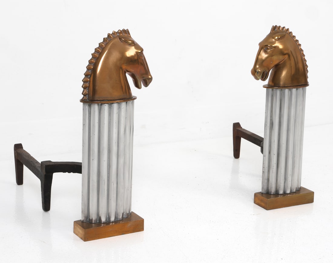 PAIR OF ART DECO BRONZE & ALUMINUM HORSE ANDIRONS: Pair of art deco andirons featuring stylized bronze sculpted horse heads atop a fluted aluminum column mounted on bronze bases. Unmarked. Circa 1930s. Dimensions: H 16" x W 14" x D 6" Condition: Wear