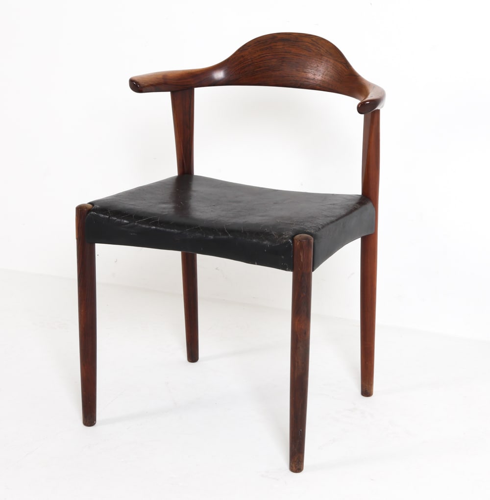 HARRY OSTERGAARD RANDERS 'BULL HORN' DINING CHAIR: Rosewood frame with black leather upholstery. Retailers tag underneath. Denmark, circa 1960s. Dimensions: H 29.5" X W 21" X D 16" x S.H. 17.5". Condition: Showing signs of wear including scratches