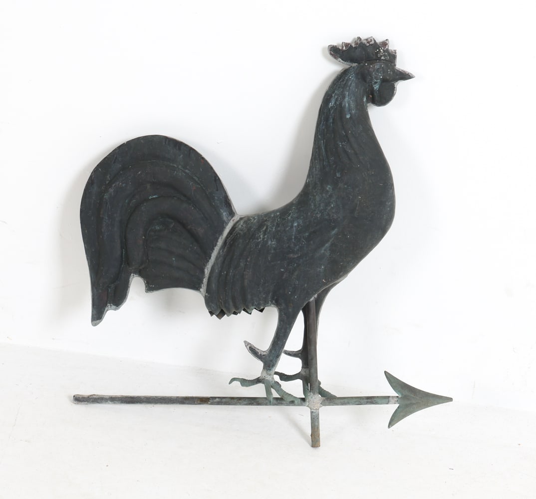 VINTAGE COPPER ROOSTER WEATHERVANE: Purportedly from the Old Fairfield Department Store. a full-bodied rooster perched atop a directional arrow. Dimensions: H 24.5 "x W 22" x D 4" Condition: Dents and scratches wear consistent with age