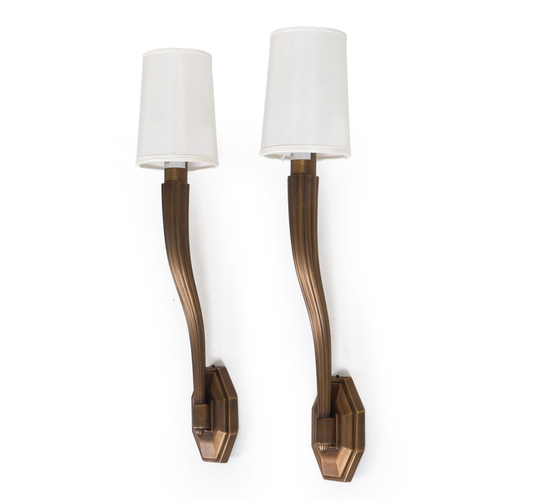 PAIR OF BRASS WALL SCONCES: Contemporary. (2) Brass wall sconces with white fabric shades. Dimensions: H 23.5" x W 4.5" x D 4.75". Condition: Wiring untested. Present well overall.