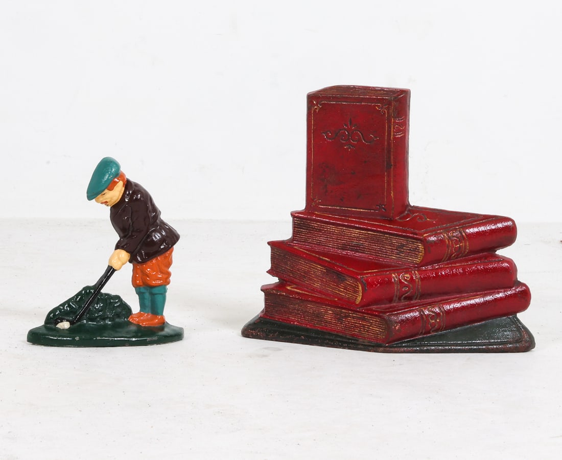 CAST IRON DOORSTOP GROUPING: (2) Cast iron doorstops with painted finish. Dimensions: Largest H 10.5" x W 11.5" x D 3". Condition: Small scratches and chips to paint, wear consistent with age and use. Some oxidation.