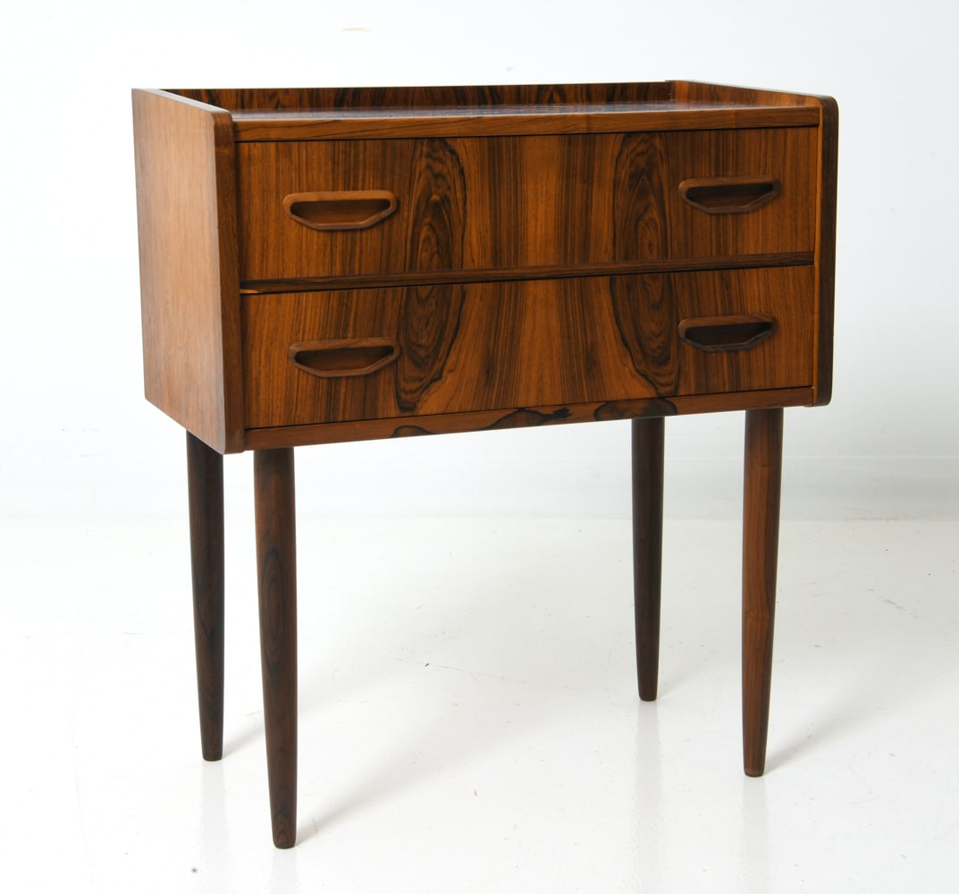 ATTR JOHANNES SORTH DANISH ROSEWOOD SIDE CHEST: With molded inset drawer pulls. In rosewood. Denmark, circa 1960s. Dimensions: H 26" x W 13" x D 23" Condition: Wear consistent with age and use. Minor fading spots to top. Couple of scuffs.