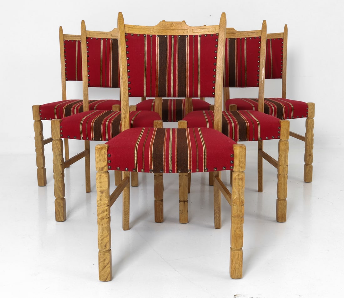 (6) KJAERNULF STYLE DANISH OAK DINING CHAIRS 1970S: Six dining chairs with striped upholstery and carved oak frame. Denmark, circa 1970s. Dimensions: H 35.75" x W 18.75" x D 20" X Sh 18" Condition: Wear consistent with age and use including rubs and sc