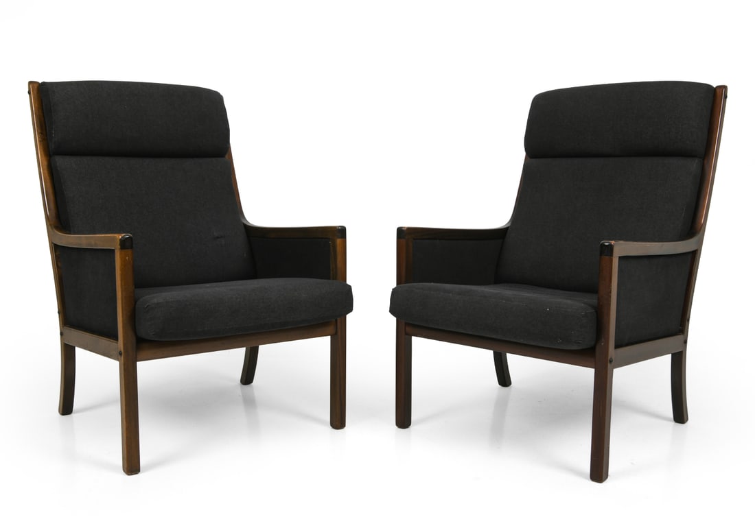 PAIR OLE WANSCHER FOR POUL JEPPESENS LOUNGE CHAIRS: Danish high-back mahogany chairs with dark tone upholstery. Marked underneath. Denmark, circa 1960s. Dimensions: H 40" x W 25" x D 34" x Sh 16.5" Condition: Wear consistent with age and use, including