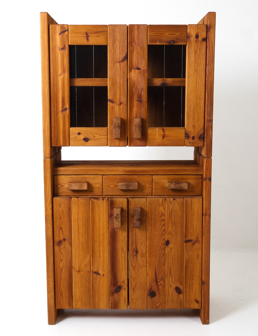 HANS FRYDENDAL FOR IDE "CHRISTIAN IV" PINE CABINET: For IDE Mobler. 2-Piece cabinet in pine. Upper section with a shelf and glass doors and lower section with cabinet and three drawers. Denmark, circa 1970s. Dimensions: H 68" x W 38.5" x D 15.5" Condit