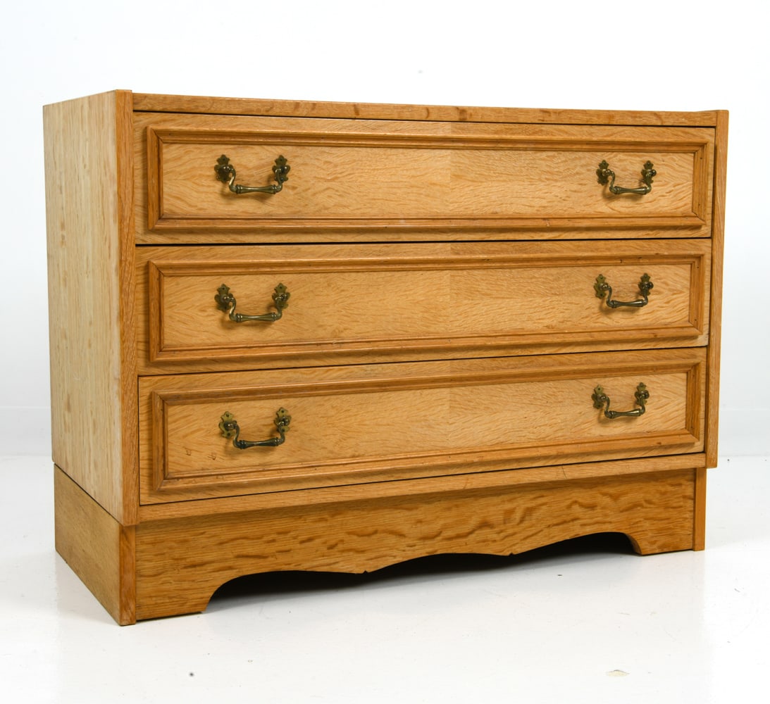 KJAERNULF STYLE DANISH OAK CHEST OF DRAWERS 1970S: With brass pulls and three drawers. Denmark, circa 1970's. Dimensions: H 25.5" x W 34.5" x D 17.25" Condition: Wear consistent with age and use. Scuffs, fading.