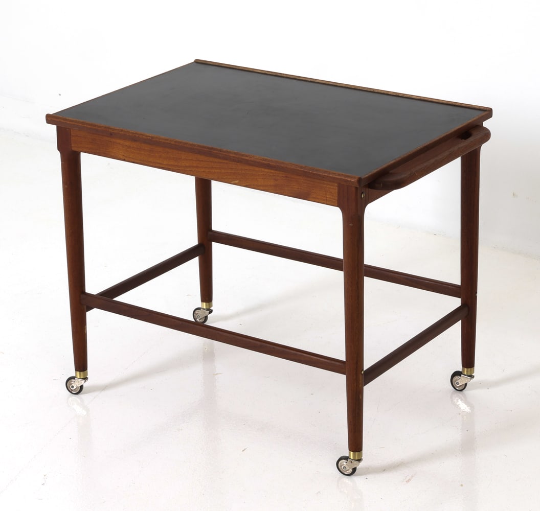 STYLE OF LUDVIG PONTOPPIDAN DANISH TEAK BAR CART: Black laminate top serving trolley or rolling bar cart on casters. Teak frame with handles to both sides. Denmark, circa 1960s. Dimensions: H 23.5" x W 31" x D 19" Condition: Wear consistent with age