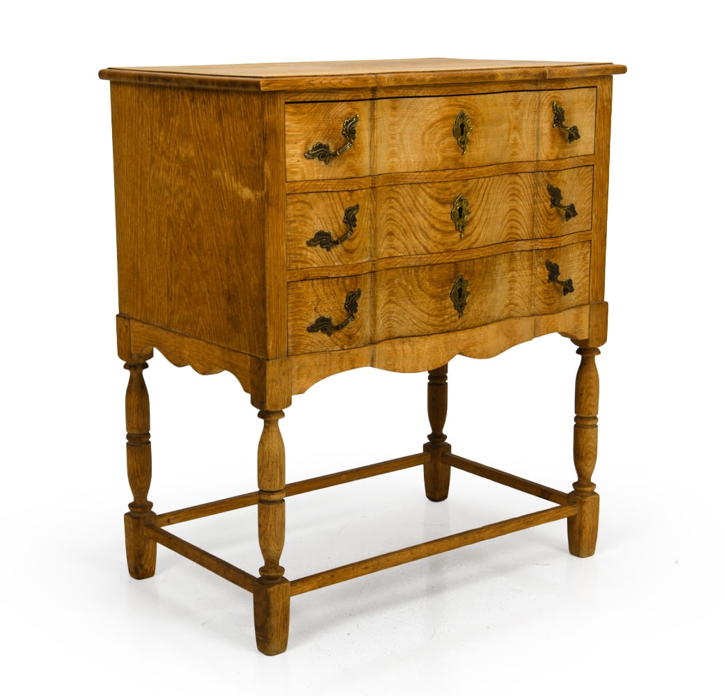 ATTR. HENNING KJAERNULF DANISH OAK CHEST C. 1970S: Three drawers with brass hardware. Key included. Apparently unmarked. Denmark, circa 1970s. Dimensions: H 26.5" x W 23" x D 14.5" Condition: Wear consistent with age and use including minor scuffs.