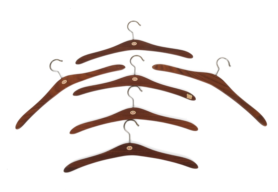 (6) RYDEN SWEDISH TEAK HANGERS GROUPING 1960'S: Swedish teak hangers. Label on frame. Circa 1960's. Dimension: H 6.75" x W 17.25" Condition: Wear consistent with age and use including minor rubs, scuffs.