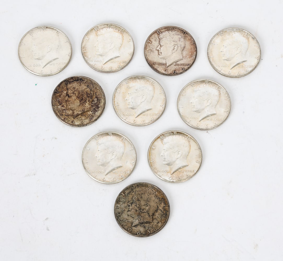 GROUPING OF 1964 KENNEDY SILVER HALF DOLLAR COINS: Includes (10) 90% silver coins. Dimensions: Each Dia 1.25". Condition: Showing varying stages of wear consistent with age