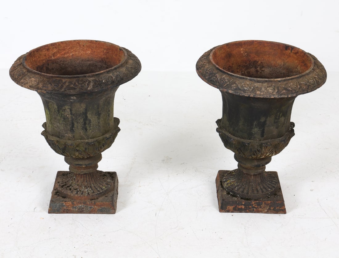 PAIR OF ANTIQUE CAST IRON GARDEN URNS: Dimensions: Each H 18" x Dia. 14.5". Condition: Wear consistent with age and use.