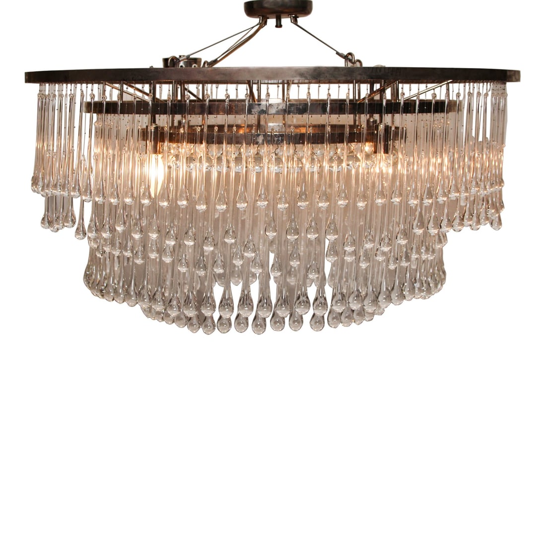 OCHRE DROP CRYSTAL WATERFALL CHANDELIER: Long slender glass pendants that end in heavy droplets are arranged in concentric rings. Dimensions: H 45" x Dia 35.5" Untested.