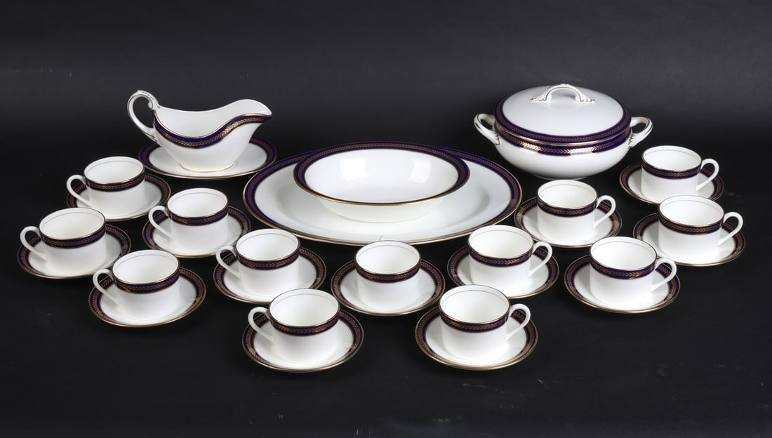 COALPORT BLUE WHEAT PORCELAIN GROUPING: Blue Wheat pattern with blue and gilded decoration to rims. Marked under bases. (13) Tea cups and saucers. Dimensions: Platter L 15.5" x W 12". Condition: Minor scuffs to bases, wear consistent with g