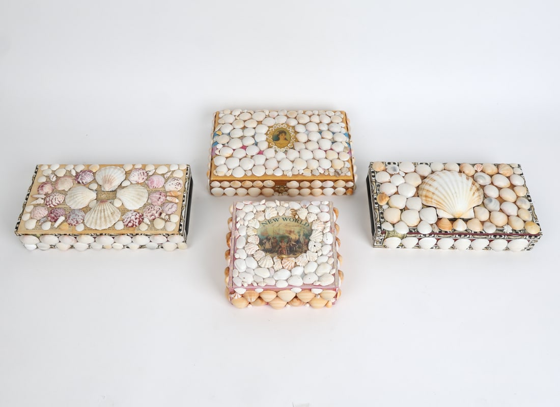 GROUPING OF DECORATIVE SHELL BOXES: Grouping of (4) shell covered cigar boxes. Dimensions: Largest H 1.75" x W 10.5" x D 7.75". Condition: Minor frays to boxes, wear consistent with gentle use.
