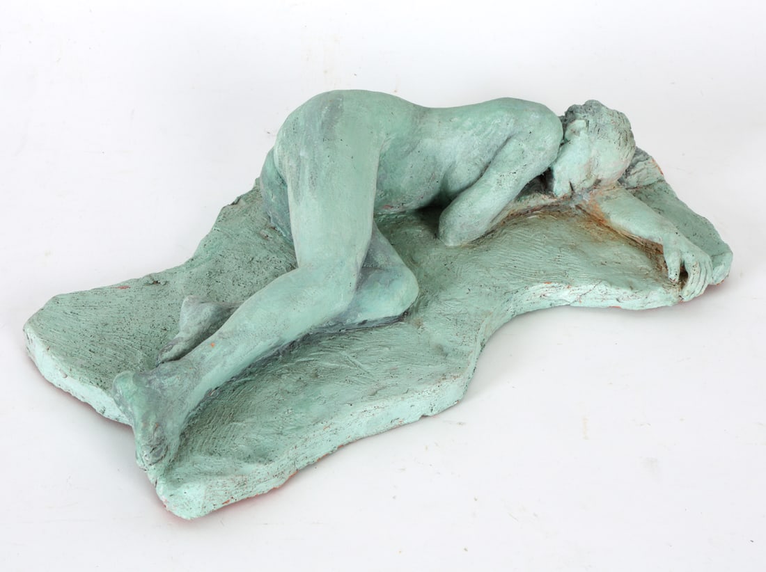 TERRACOTTA NUDE SCULPTURE: Terracotta sculpture of a nude female figure laying on her side. Apparently unsigned. Dimensions: H 15.5" x W 8.75" x D 3.23". Condition: Wear consistent with age and use including rubs and scuffs, lo