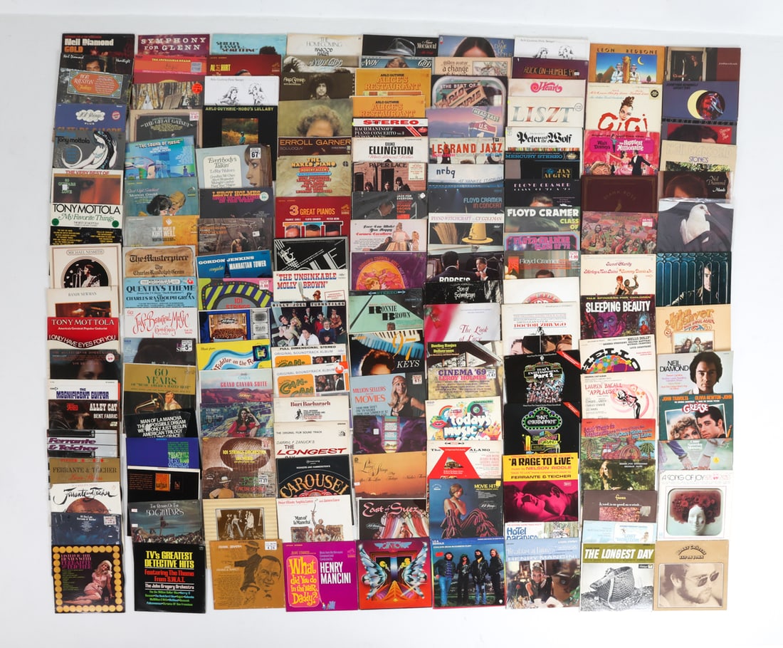 GROUPING OF VINTAGE RECORDS: Approx.100 records Dimensions:(box) H 13" x W 13" x D 13". Condition: With varying stages of wear consistent with age and use. Not tested.