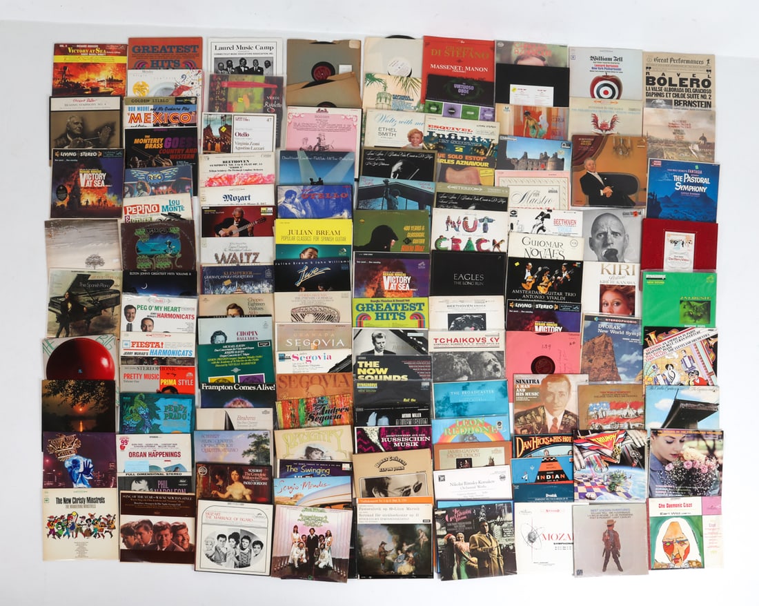 GROUPING OF VINTAGE RECORDS: Approx.100 records Dimensions:(box) H 13" x W 13" x D 13". Condition: With varying stages of wear consistent with age and use. Not tested.