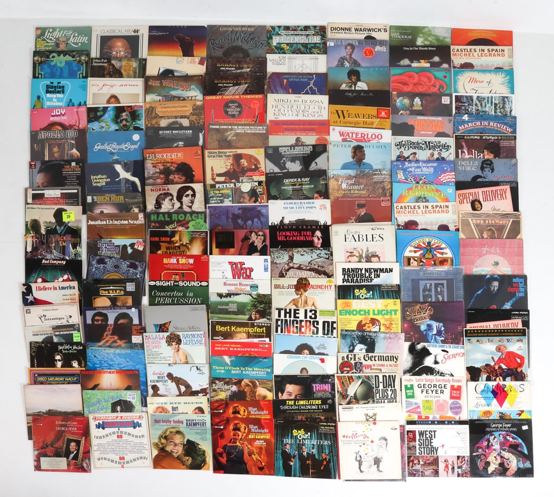 GROUPING OF VINTAGE RECORDS: Approx.100 records. Dimensions:(box) H 13" x W 13" x D 13". Condition: With varying stages of wear consistent with age and use. Not tested.