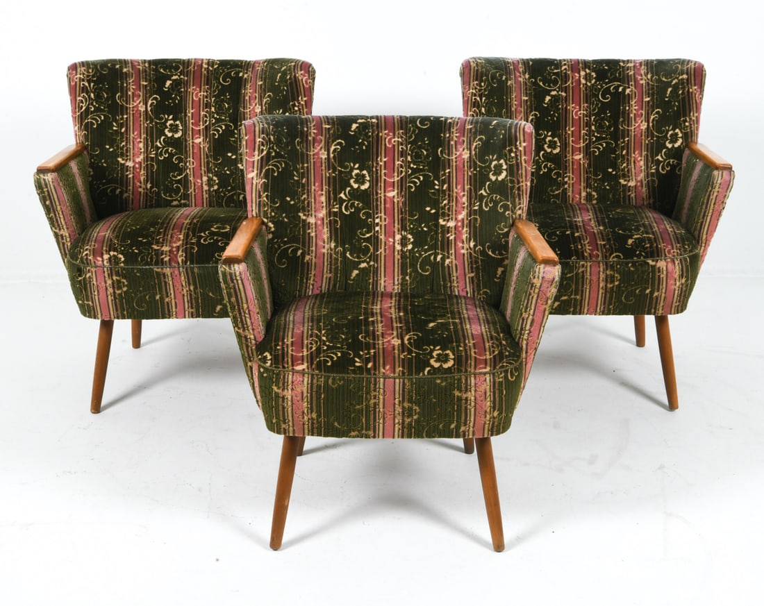 (3) SWEDISH BEECH & VELOUR LOUNGE CHAIRS 1960S: Grouping of (3) lounge chairs with green and pink velour upholstery with cut damask pattern. Tapered beech legs and arms. Sweden, circa 1960s. Dimensions: H 31" x W 24.5" x D 27" x SH16.5". Condition: