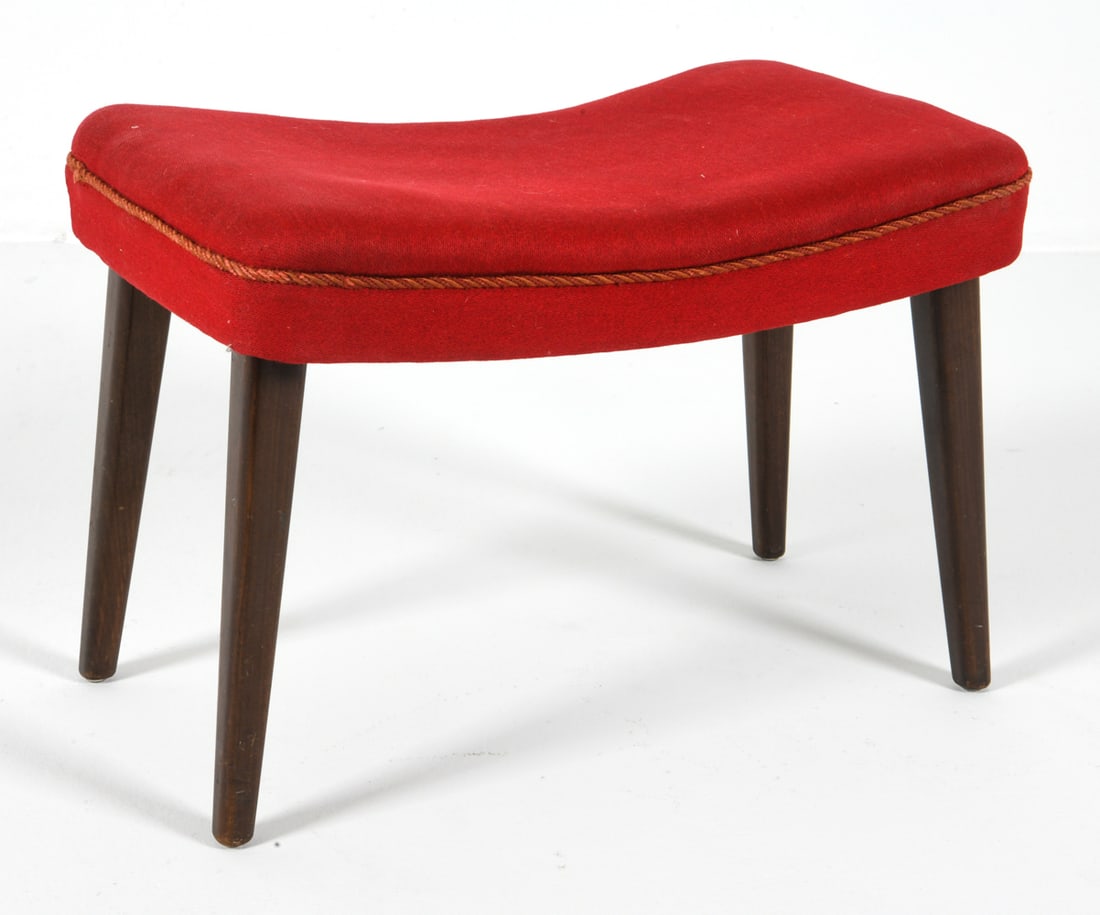 STYLE OF MADSEN & SCHUBELL DANISH STOOL C. 1960S: Tapered beech legs with red wool upholstery. Denmark, circa 1960s. Dimensions: H 15.5" x W 22.5" x D 13.5". Condition: Wear consistent with age and use including minor dings and rubs to legs. GERT G12