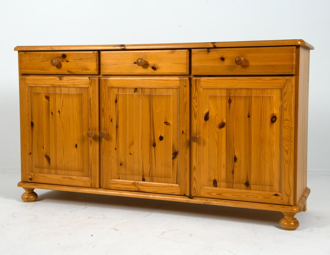 BO SKAN STYLE DANISH PINE CABINET C. 1970S: Pine cabinet with drawers and cabinets with rounded drawer pulls and feet. Denmark, circa 1970s. Dimensions: H 32.5" x W 58" x D 18". Condition: Minor scratches and small dings. Wear consistent with a