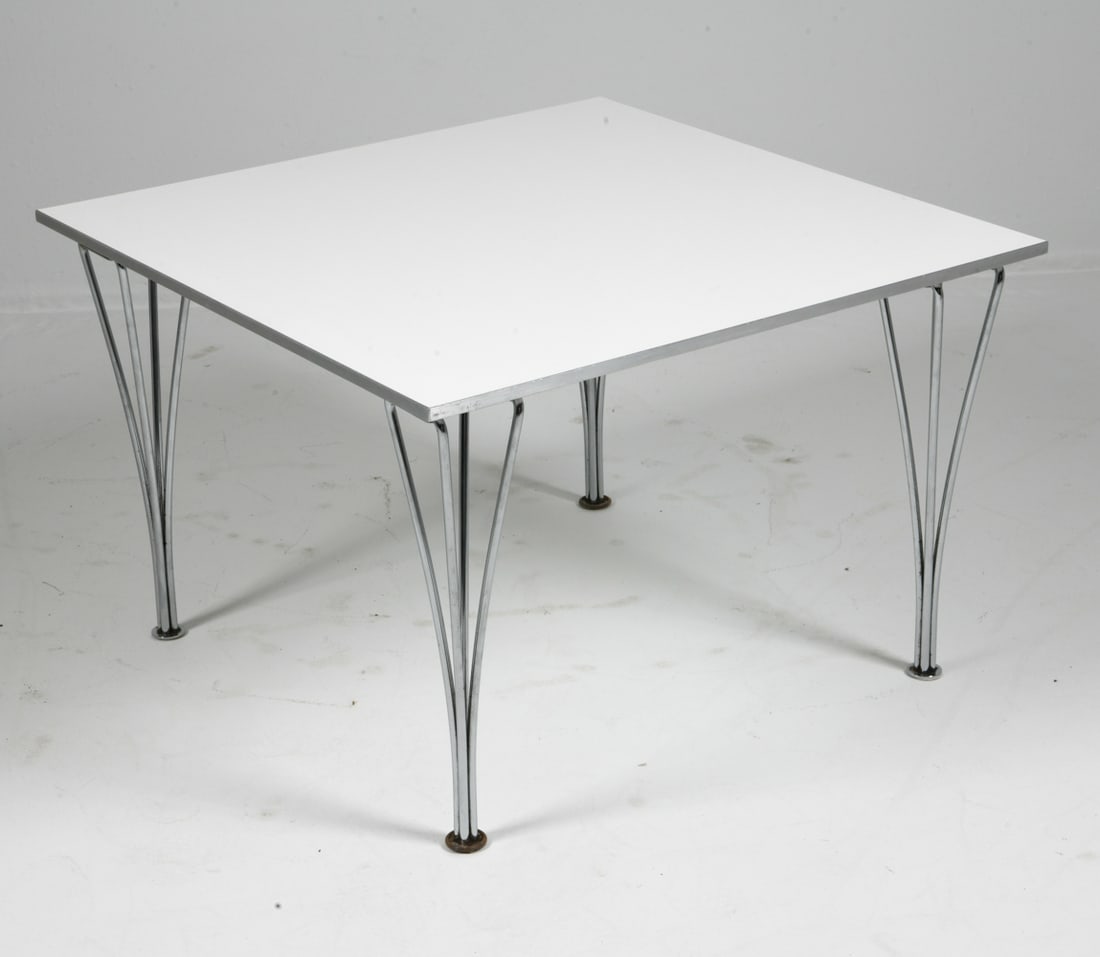 MATHSSON & HEIN FOR FRITZ HANSEN COFFEE TABLE: By Bruno Mathsson and Piet Hein for Fritz Hansen. Rectangular coffee table with white laminate top, chrome-plated steel legs and aluminum edge. Steel legs. Tagged and dated underneath. Denmark, 1994.