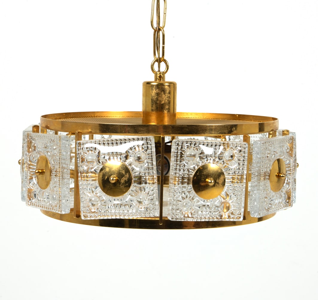 CARL FAGERLUND ORREFORS SWEDISH PENDANT LIGHT: Brass pendant light with crystal glass panels around rim. Sweden, circa 1960s. Dimensions: H 8.5" x Dia. 14 ". Condition: Showing very light signs of wear consistent with age and gentle use.