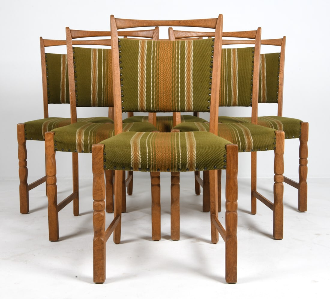 (6) STYLE OF KJAERNULF OAK & WOOL DINING CHAIRS: Oak frames with wool upholstery. Denmark, circa 1970s. Dimensions: H 37" x W 18.75" x D 20" x Sh 18.25". Condition: Wear consistent with age and use, including minor rubs and scuffs. DMW033