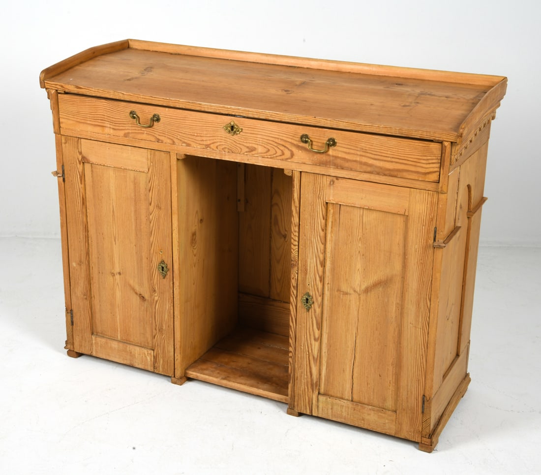 SWEDISH PINE SLANT SURFACE LECTERN CONSOLE DESK: Key included. Pine store counter or work station. Brass pulls. Sweden.. Dimensions: H 37" x W 48" x D 17". Condition: Few locks require maintenance. Scuffs and dings, wear consistent with age and use.