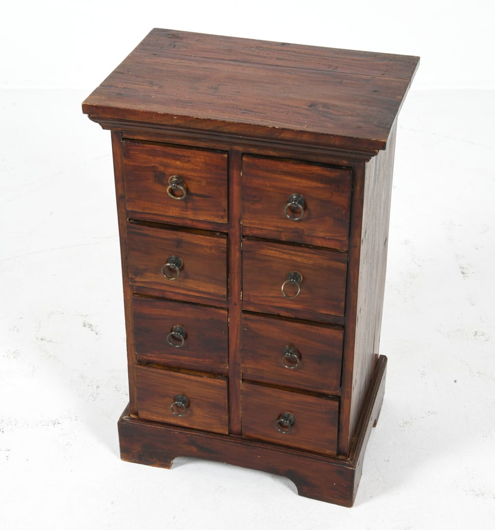 SCANDINAVIAN MAHOGANY APOTHECARY CHEST: Small mahogany apothecary chest with brass ring drawer pulls. Denmark, circa 1960s. Dimensions: H 27.5" x W 15.25" x D 11.5". Condition: Scuffs and dings to corners. Few drawers are slightly askew. We