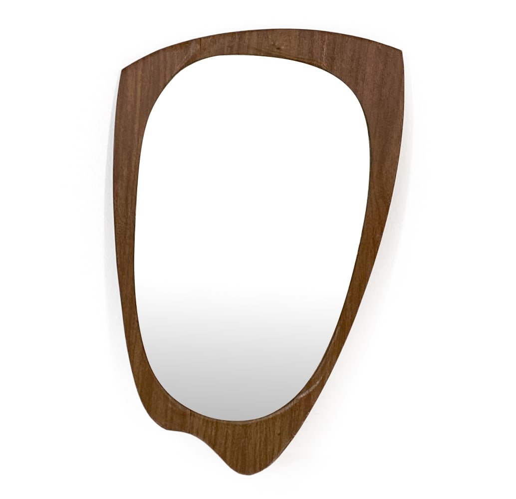 DANISH TEAK ATOMIC WALL MIRROR C. 1960S: Atomic-shaped wall mirror with teak veneer frame. Denmark, circa 1960s. Dimensions: H 23" x W 14.5". Condition: Veneer peeling in places. Wear consistent with age and use. V195
