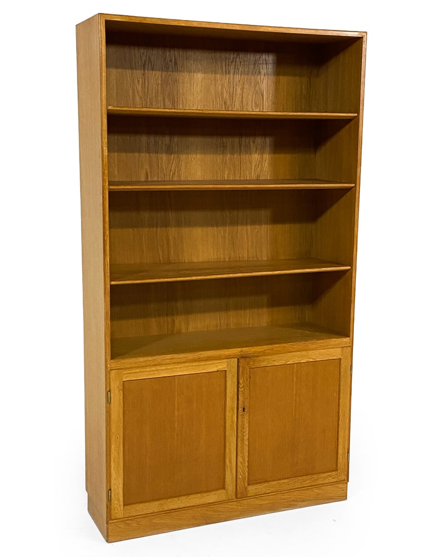 A/S SOBORG DANISH OAK BOOKCASE CABINET C. 1970S: Key included. Adjustable shelves. Apparently untagged. Dimensions: H 71.5" x W 39.5" x D 12.5". Condition: Slight sun fading. Lock slightly sticky. Wear consistent with age and use. V008