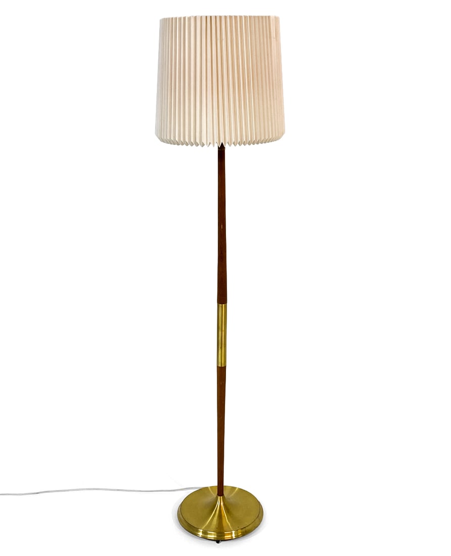 DANISH TEAK & BRASS FLOOR LAMP C. 1970S: Floor lamp with teak and brass segments to stand and brass base. Denmark, circa 1970s. Dimensions: H 60" x Dia. 11". Condition: Wiring untested, European plug. Scratches and dings to base. Wear consis