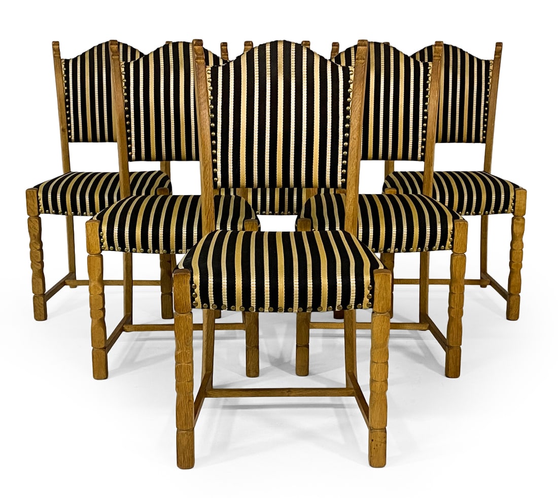 (6) HENNING KJAERNULF STYLE DANISH DINING CHAIRS: Oak frames with turned front legs. Black & white striped fabric with brass tacks accents. Denmark, circa 1970s. Dimensions: H 37" x W 18.5" x D 19" x SH 18". Condition: Scuffs and rubs to wood, wear c