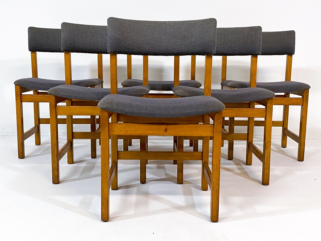 (6) FARSTRUP DANISH OAK DINING CHAIRS C. 1970S: Tagged underneath. Oak frames with grey wool upholstery. Denmark, circa 1970s. Dimensions: H 31.5" x W 19.5" x D 16.5" x SH 18.5". Condition: Slight fading to fabric. Small scratches and dings to wood