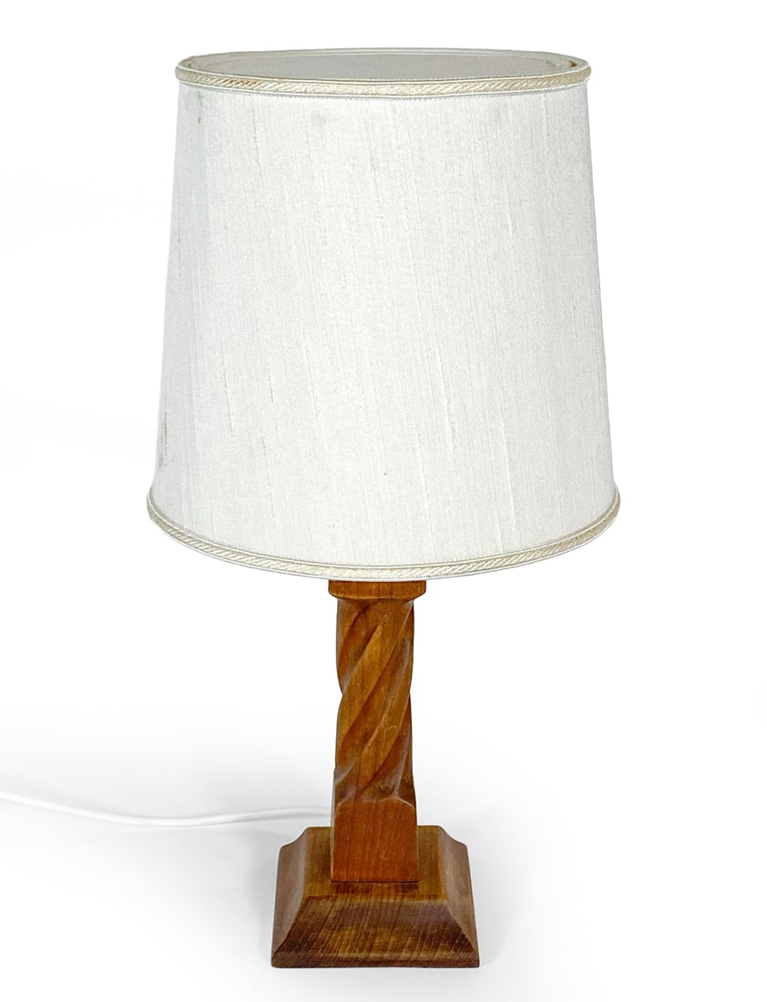 DANISH TEAK TABLE LAMP C. 1960S: Teak table lamp with barley-twist design. Denmark, circa 1960s. Dimensions: H 20" x Dia. Shade 10". Condition: Wiring untested, European plug. Slight fading to base. Wear consistent with age and use,
