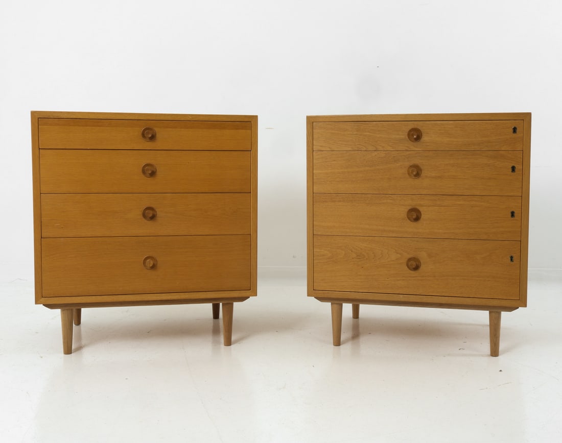 PAIR BORGE MOGENSEN "ORESUND" CHEST OF DRAWERS: For Karl Andersson & Soner. One key included. Oak frame with sculpted pulls. Four drawers with dividers inside. One chest with key holes. Stamped to backside. Sweden, circa 1970s. Dimensions: H 29.25"