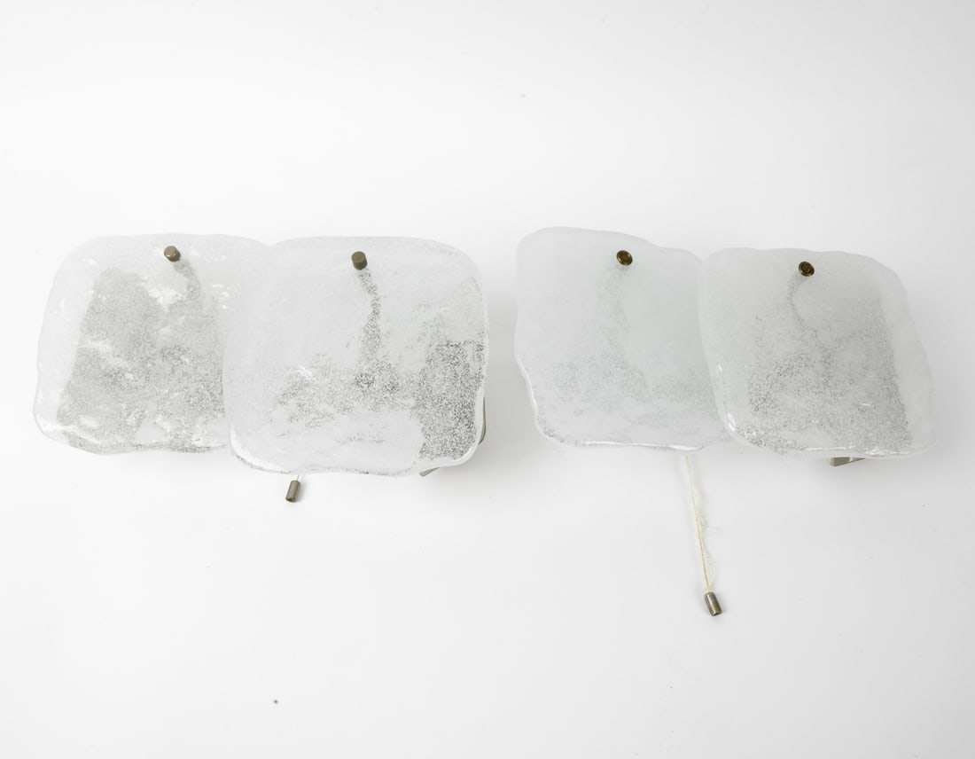 (2) JE KALMAR AUSTRIAN ICE GLASS VANITY LIGHTS: Sculptural, textured "ice glass" panels mounted to a nickel plated frame. Tagged, engraved on socket. Austria circa 1970's. Dimensions: H 7" x W 13" x D 4.75" Condition: Not tested, Wear consistent wi