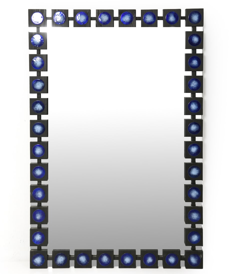 AB GLAS & TRA SWEDISH PINE & ENAMEL WALL MIRROR: Pine wall mirror in ebonized finish with blue enamel discs around the frame. Tagged on back. Sweden, circa 1970s. Dimensions: H 47.5" x W 31.5". Condition: Small scuffs and dings, rubs to edges of woo