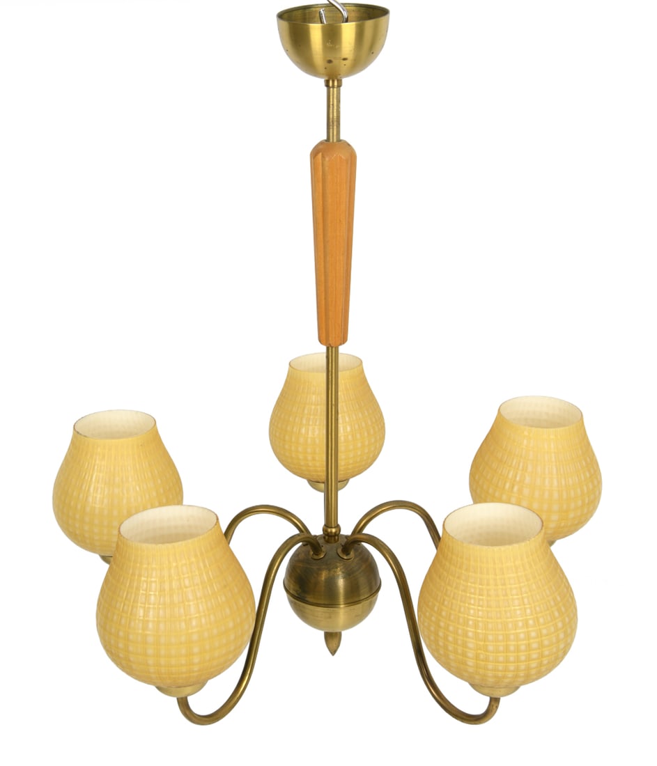 VINTAGE SWEDISH BRASS & GLASS CHANDELIER C. 1950S: With yellow glass shades, brass arms and beech detail. Sweden, circa 1950's. Dimensions: H 25" x Dia 23" Condition: Wear consistent with age and use. Untested, Soiling to sockets. Some patina to brass