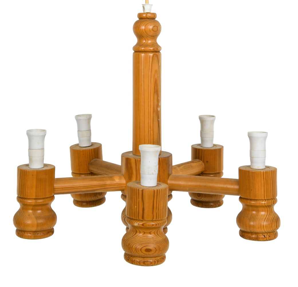 SWEDISH PINE CHANDELIER C. 1960S: Turned pine chandelier with 5 arms. Sweden, circa 1960's. Dimensions: H 15" x Dia 16" Condition: Wear consistent with age and use. Untested, Couple of minor nicks.