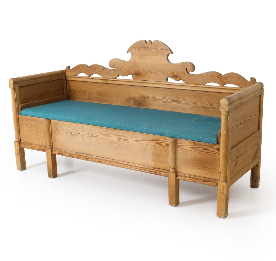 ANTIQUE SWEDISH PINE BENCH: Pine sofa with decorative top rail backrest and a seat that lifts to reveal a storage compartment. Patterned teal upholstered cushion. Sweden, 19th century. Dimensions: H 41" x W 73.5" x D 14.5" x SH